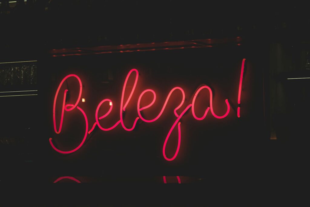 close up of neon sign on black background