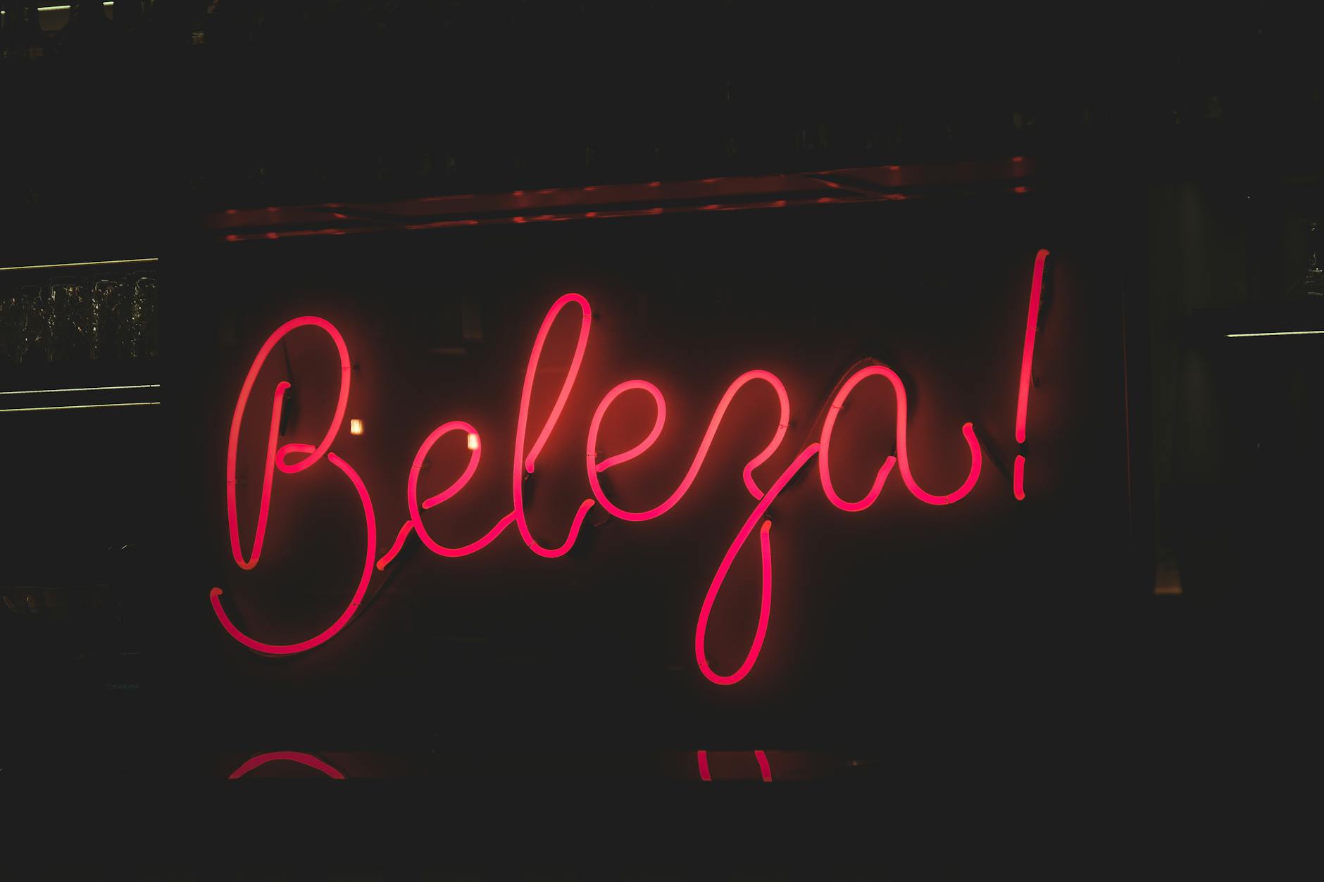 close up of neon sign on black background